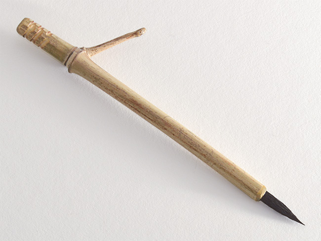 1” Goat bristle brush with bamboo cane handle.