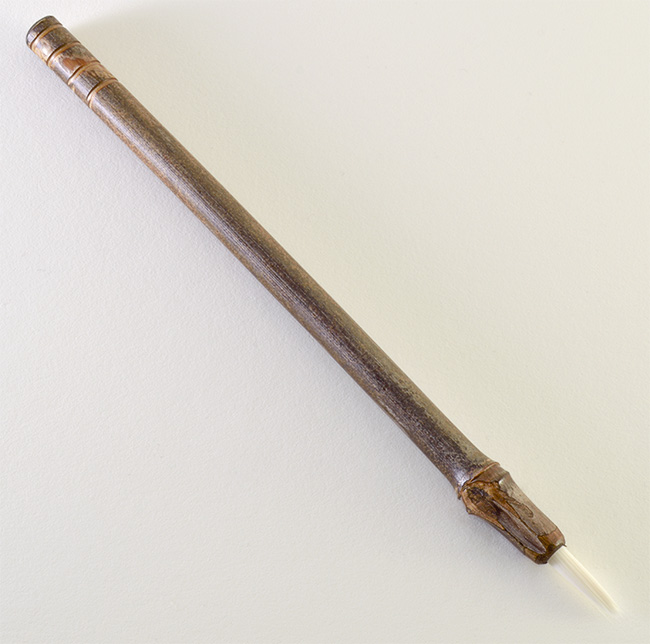 Medium size 1” bristle length Stiff White Synthetic, with bamboo cane handle.