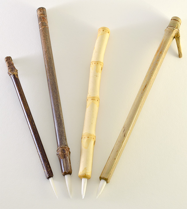 Brush set with small, medium, wangi medium, and large size 1.5” bristle length Stiff White Synthetic, with bamboo cane handles.